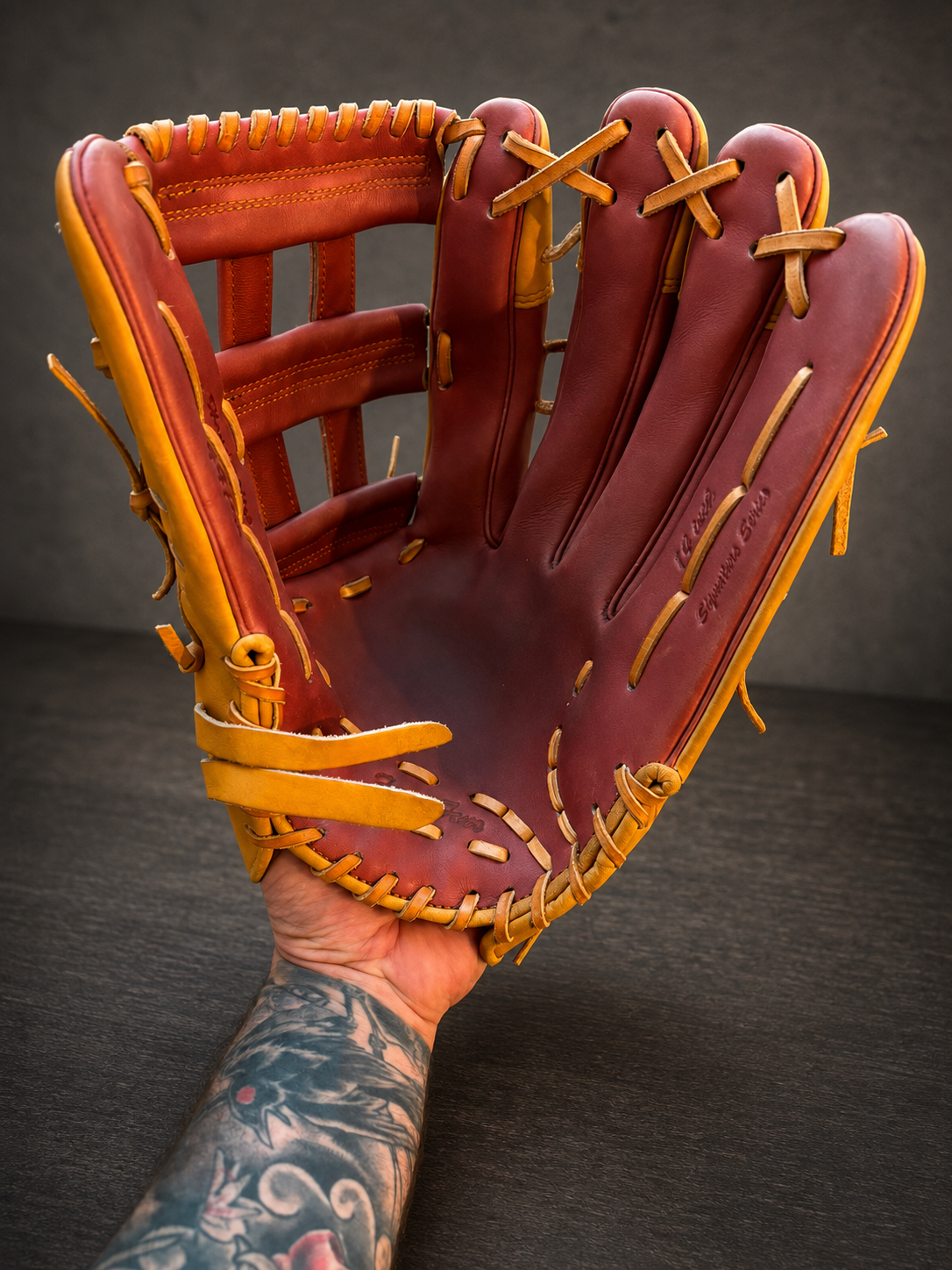 Hands shaping a baseball glove at Pocket Smith